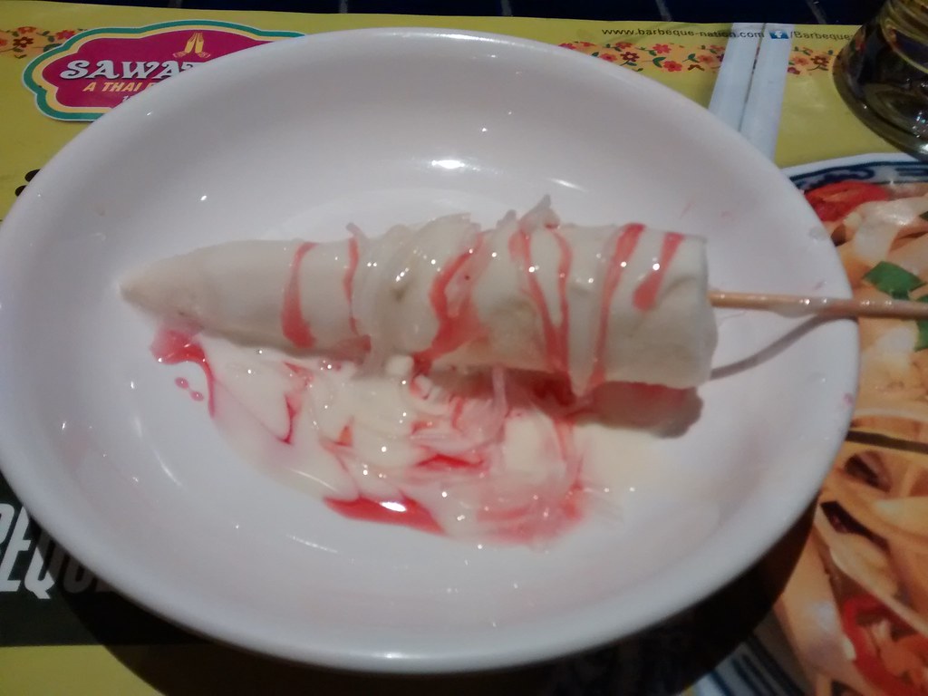 Saffron kulfi dessert topped with syrup